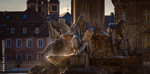 Fototapeta Naklejka Na Ścianę i Meble -  Old fountain in town of Wurzburg, Bavaria, Germany