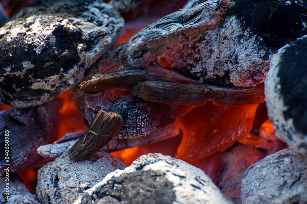 hot coals burning in the grill