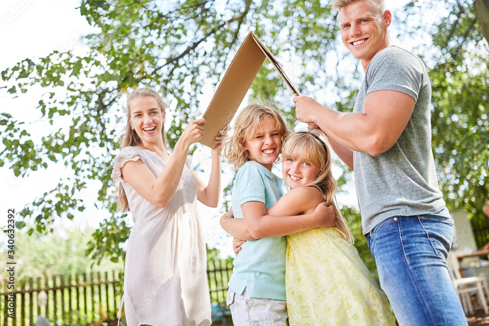 Fototapeta premium Children hug under umbrella