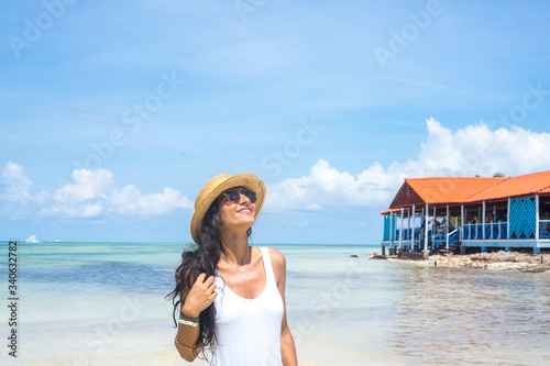 Young indian woman happy in the sea