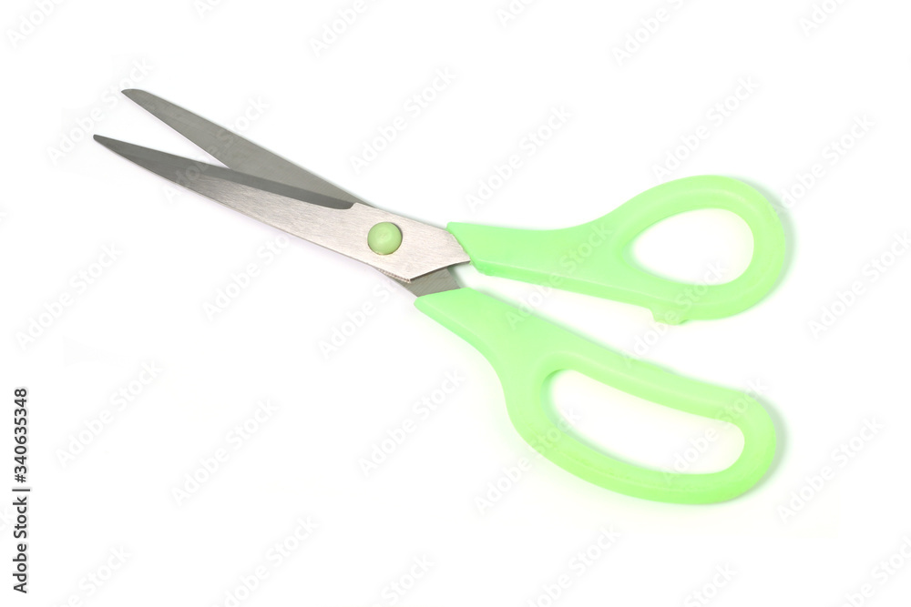 Green isolated scissors on white background Green isolated scissors on white background