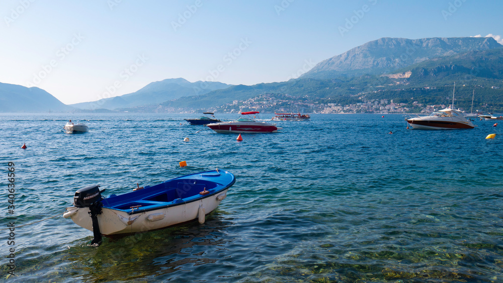 Boats in the small marina of the village of Rose - August 6, 2019 / Rose Village, Lustica peninsula, Kotor Bay, Montenegro, Europe.