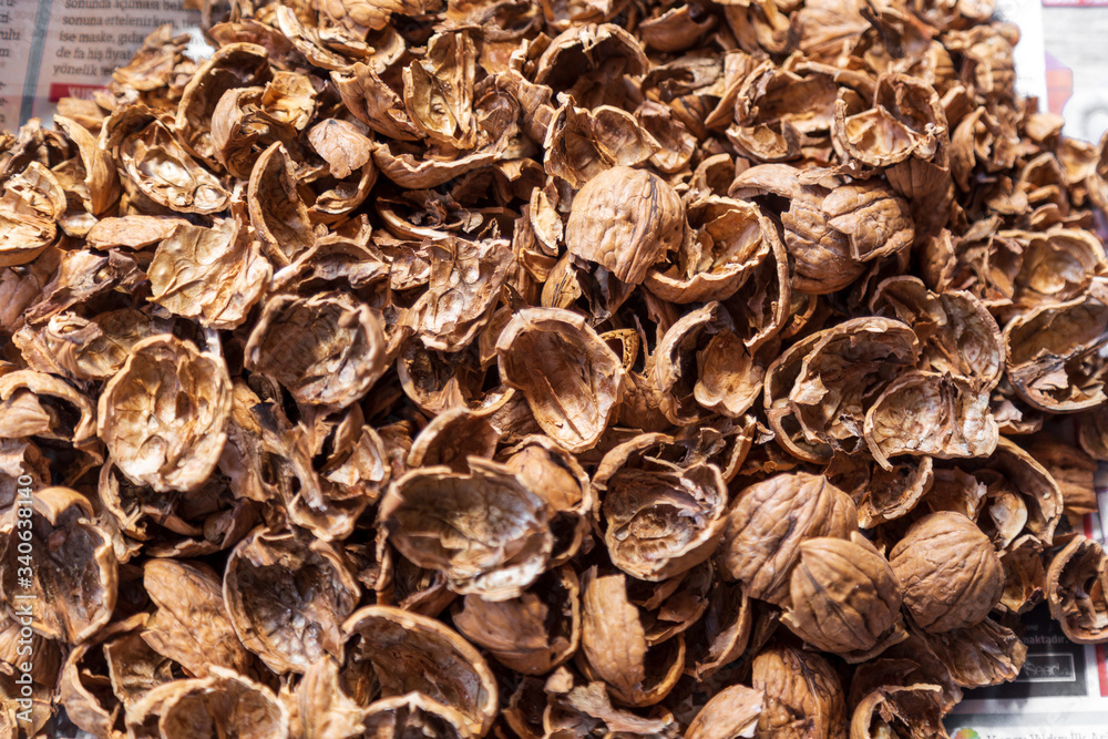 Broken walnut shells. Pieces of shell fruits. Broken walnut shells. Pieces of shell fruits.