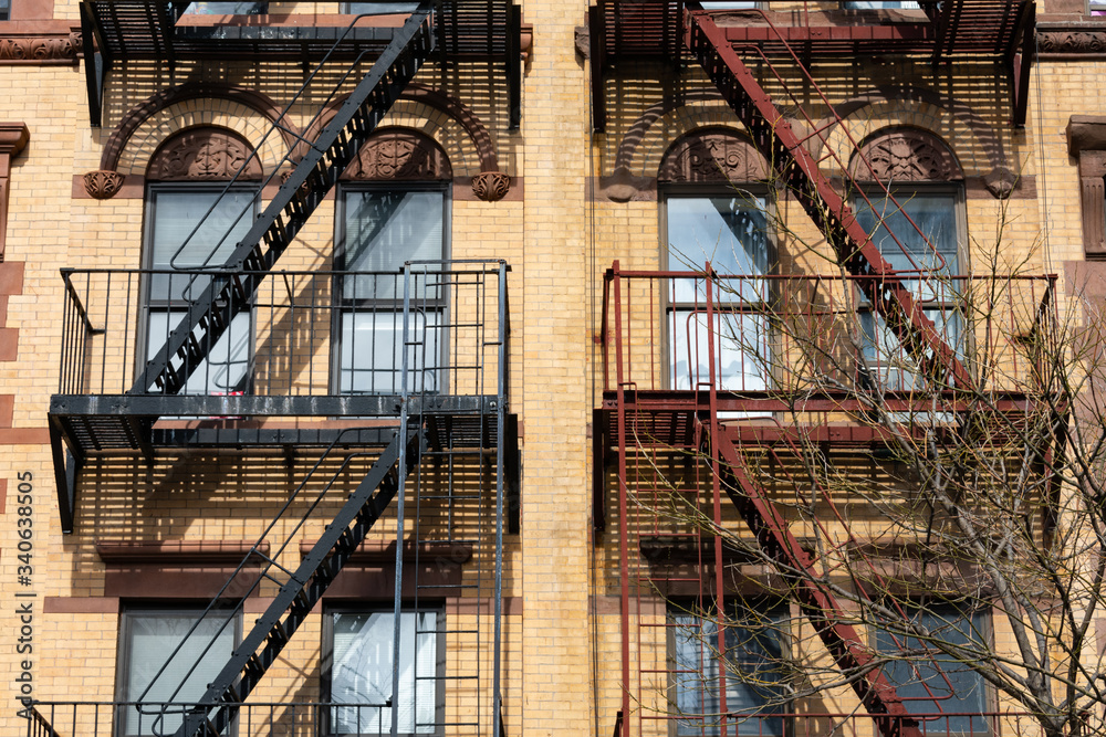 Beautiful Old Apartment Building Exterior with Fire Escapes in New York City