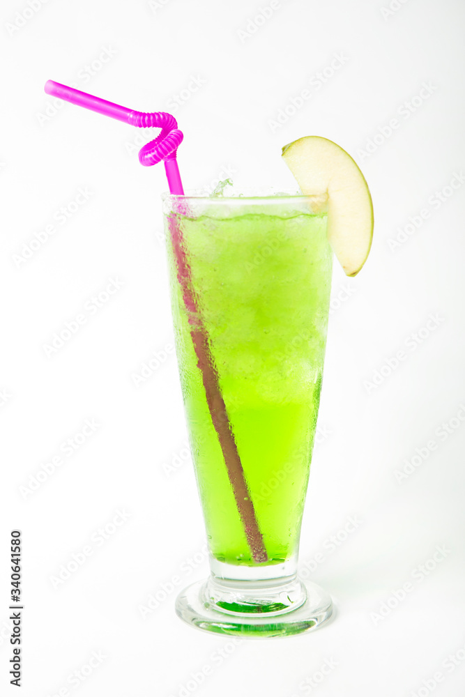 green apple juice drink in a tall glass decorated with sliced green apple isolated white background green apple juice drink in a tall glass decorated with sliced green apple isolated white background