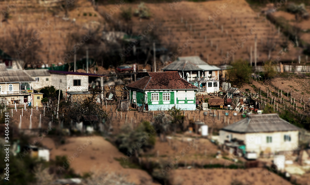 Beautiful spring landscape in Republic of Moldova. Green landscape. Spring Nature. Park with Green Grass and Trees. Travel in Europe. Field with blooming tree and rocks.