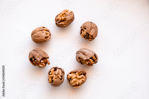 pilled walnut isolated on white background. Composition from nuts on the white isolated background