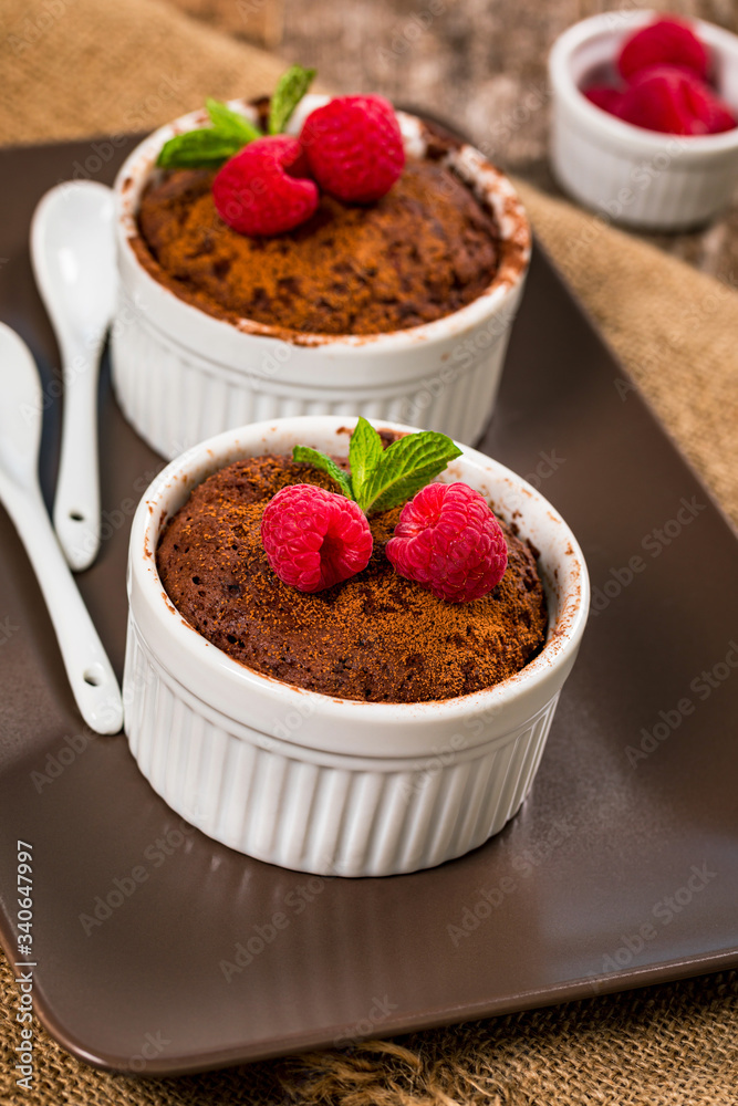 Mug Chocolate Cake. Instant Chocolate Cake in Portion Bowl. Selective focus. Mug Chocolate Cake. Instant Chocolate Cake in Portion Bowl. Selective focus.