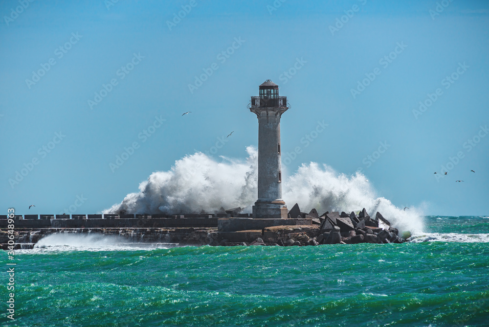 Waves crashing on Lighthouse