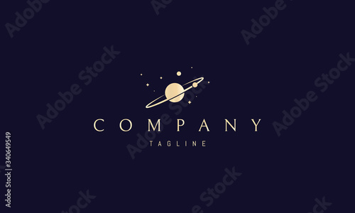 Vector golden logo on which an abstract image of a planet with an orbit in outer space.
