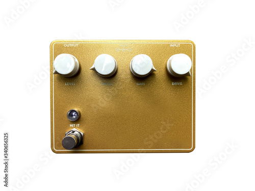 Isolated gold vintage overdrive stomp box effect on white background with work path. photo