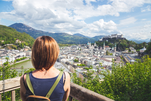 Holiday in Salzburg: Young girl is enjoying the view. Historic district, Festung Hohensalzburg © Patrick Daxenbichler