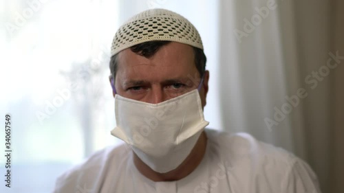 Arabic man in protective mask.Covi 19 photo