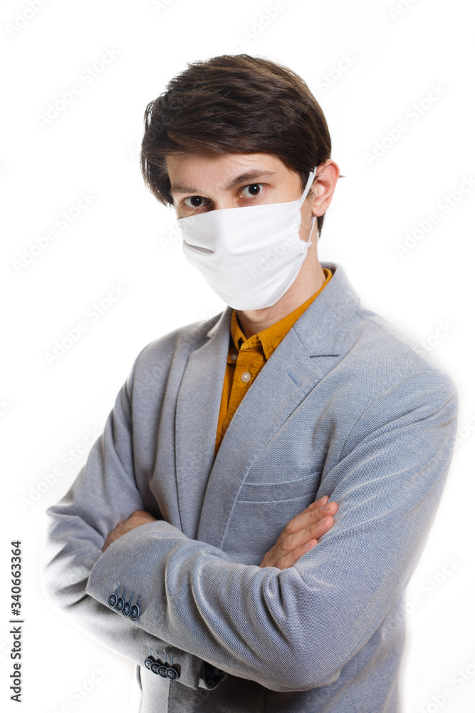 is time to protect all the time. elegant man wearing a mouth protection to prevent getting sick at work is time to protect all the time. elegant man wearing a mouth protection to prevent getting sick at work