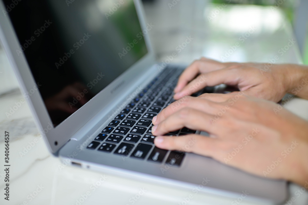 Work from home concept present by business man using laptop at home in living room. Work from home concept present by business man using laptop at home in living room.