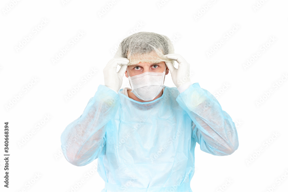 portrait of doctor in mask and in protective equipment uniform. isolated on white background portrait of doctor in mask and in protective equipment uniform. isolated on white background