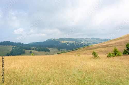 Hill Slopes and Cloudy Sky