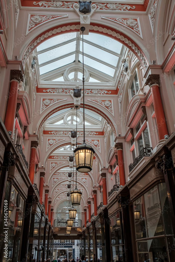 Inside of the Leadenhall market with covered roof and shopping arcade, one of the oldest markets in London, dating back to the 14th century.