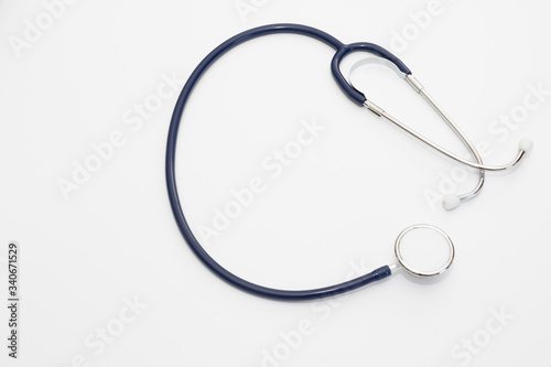 Stethoscope isolated on white, top view. Medical tool. Health care concept.