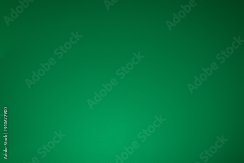 Smooth gradient background, green texture.