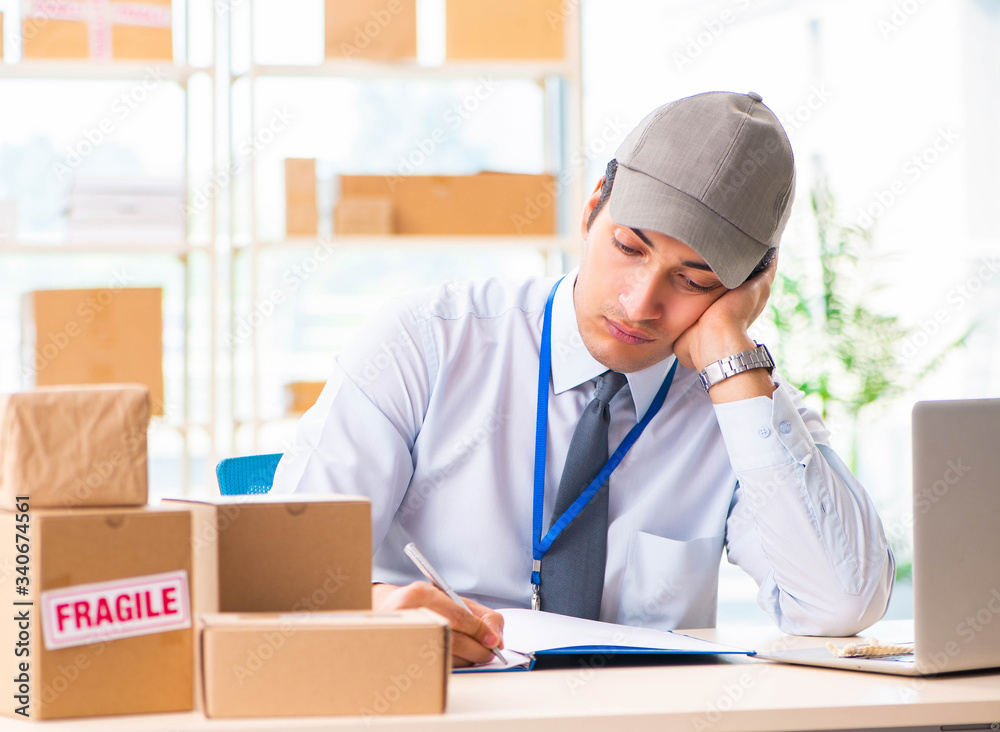 Male employee working in box delivery relocation service Male employee working in box delivery relocation service