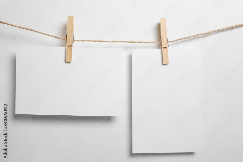 Polaroid photo frames. Square frame template with shadows isolated on transparent background.white sheet on clothesline with clothespin Polaroid photo frames. Square frame template with shadows isolated on transparent background.white sheet on clothesline with clothespin