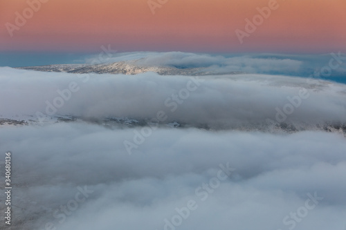 First snow in November in Karkonosze Mountains- sunrise in Sniezka peak the highest mountain in Sudety range.