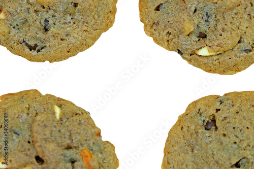 Homemade soft and chewy chocolate chip cookies in the corner of the frame isolate on white background.