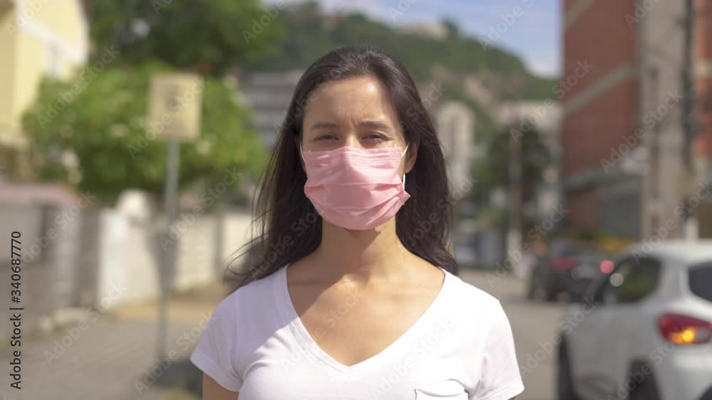 Pandemic, portrait of a young tourist woman wearing protective mask on street crowd people. the concept health and safety, N1H1 coronavirus quarantine, virus protection
Pandemic, portrait of a young tourist woman wearing protective mask on street crowd people. the concept health and safety, N1H1 coronavirus quarantine, virus protection