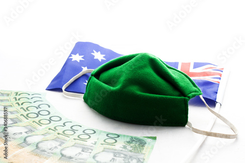 concept 100 Dollar Australian. medical green mask, Economy crisis. Health expense. Outbreak of coronavirus.} have copy space for text, white background