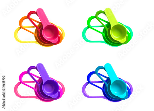 colorful measuring cups isolated on white background
