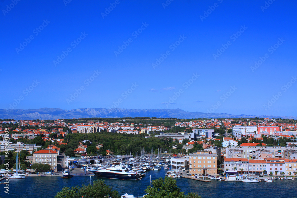 City on the Adriatic Sea, luxurious apartment buildings near the water, promenade, main bridge Zadar, Croatia. A tourist place, a beautiful and clean city in Europe.Photography for tourism advertising