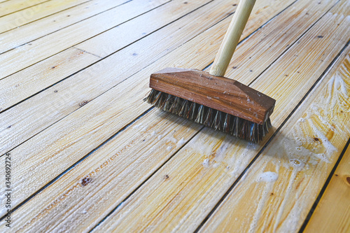 spring cleaning wooden floor with soft soap