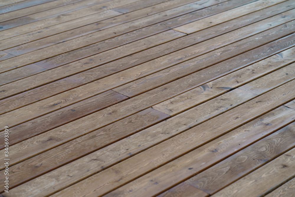 The texture of the wooden bridge across the river. Top view / view from above. Suitable as template and natural background, free space for your message The texture of the wooden bridge across the river. Top view / view from above. Suitable as template and natural background, free space for your message