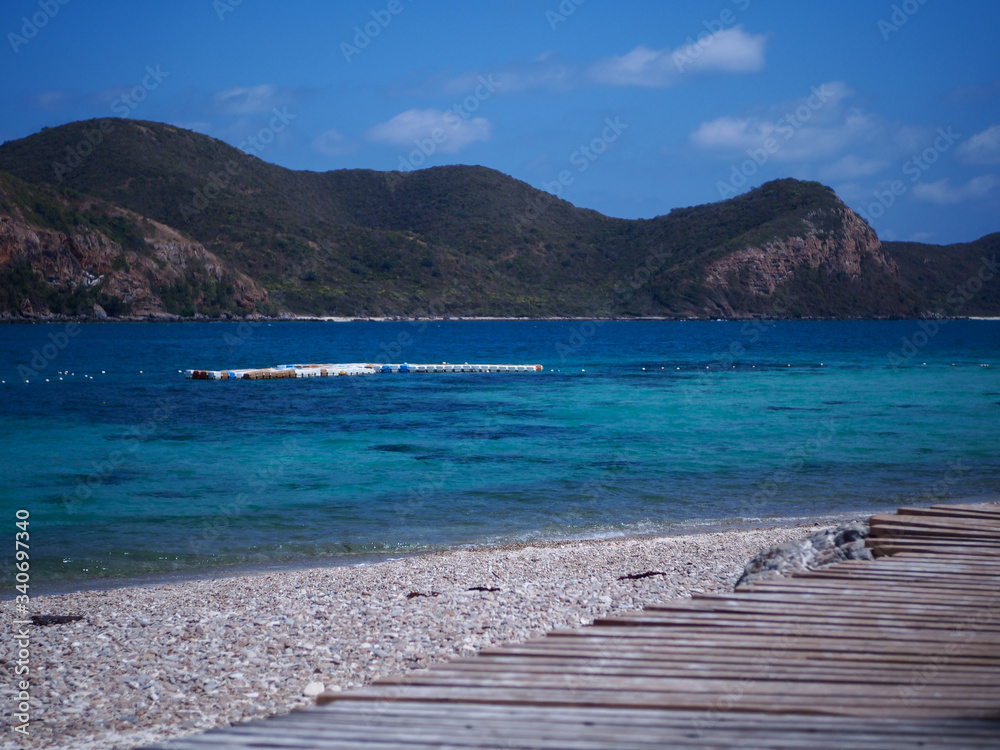 Fototapeta premium View of the beach, sea and mountains.