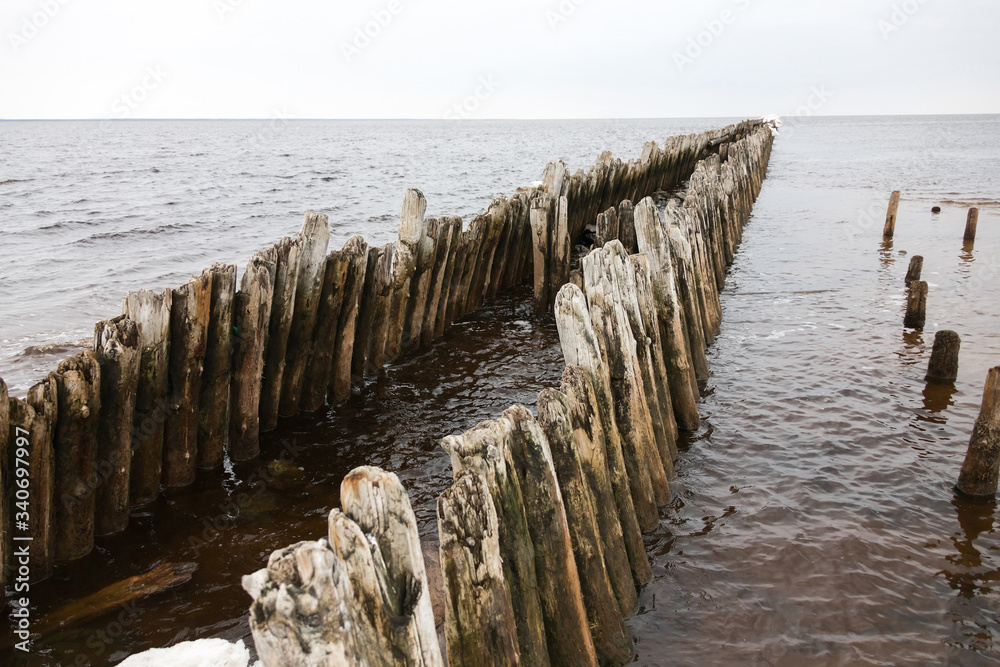 a breakwater destroyed by time