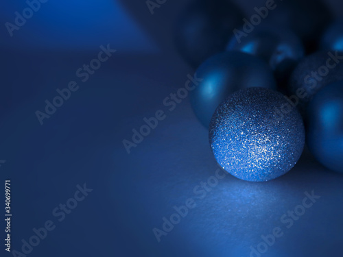 Christmas mood background blue balls on a blue background
