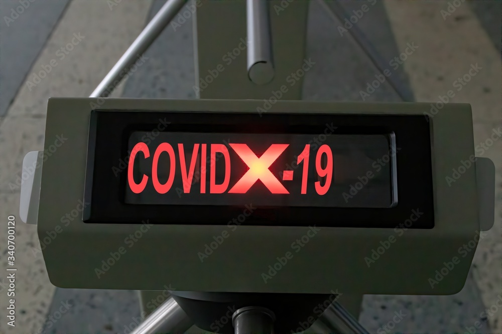 ''COVID X-19'' indication on a turnstile tripod screen ''COVID X-19'' indication on a turnstile tripod screen