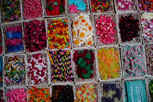 large quantities of sweets of thousands of colors and flavors