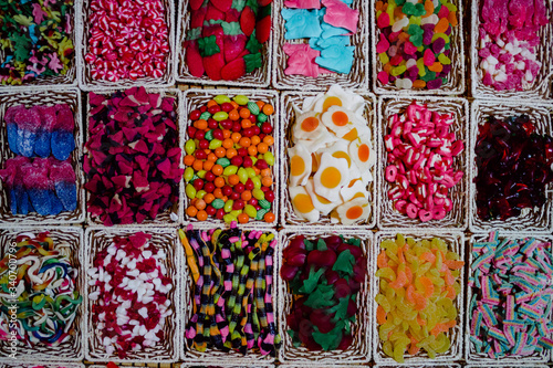 large quantities of sweets of thousands of colors and flavors