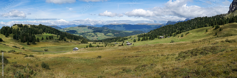Stunning panoramic view: The famous Alp de Siusi - Seiseralm in South Tyrol. Also view to Rosengarten Group and Mountain Sciliar