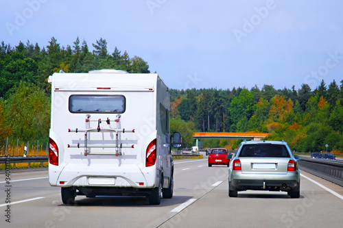 Road with Camper and cars Switzerland reflex