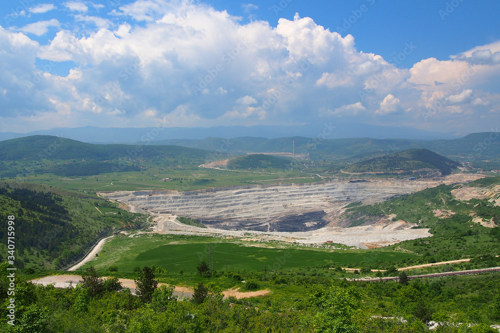 Fototapeta premium Surface ground charcoal exploitation. Industrial coal mining.