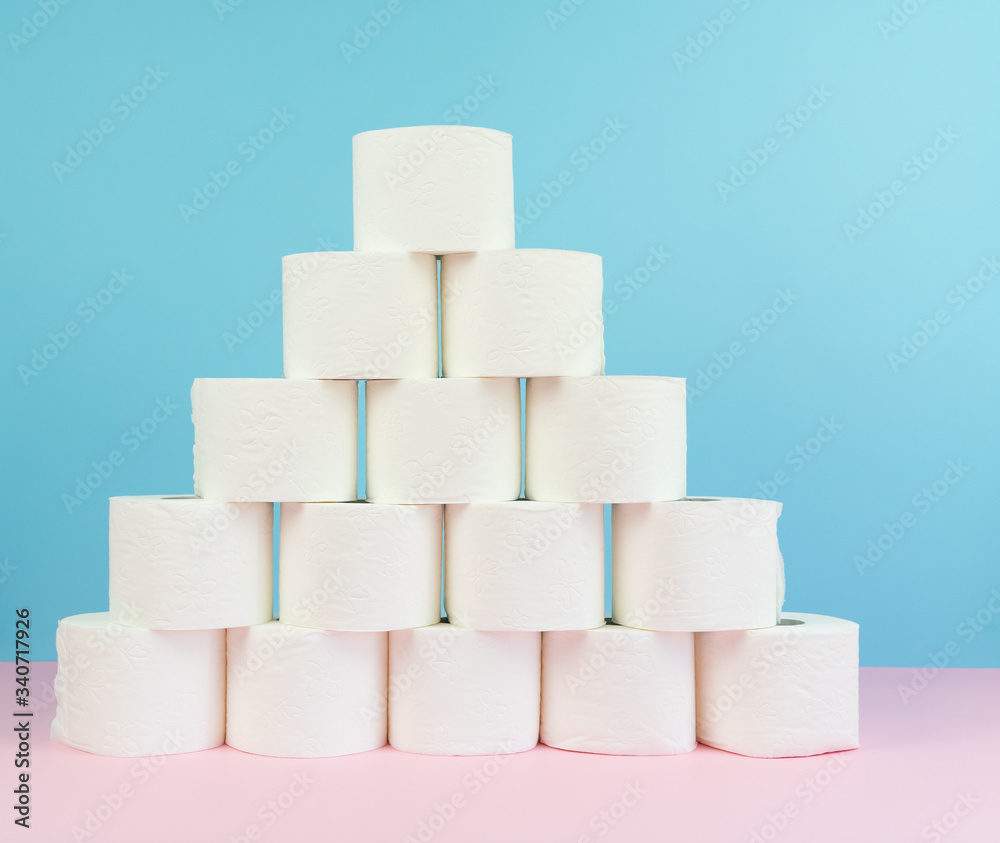 Image of toilet paper tower at pastel background. Image of toilet paper tower at pastel background.