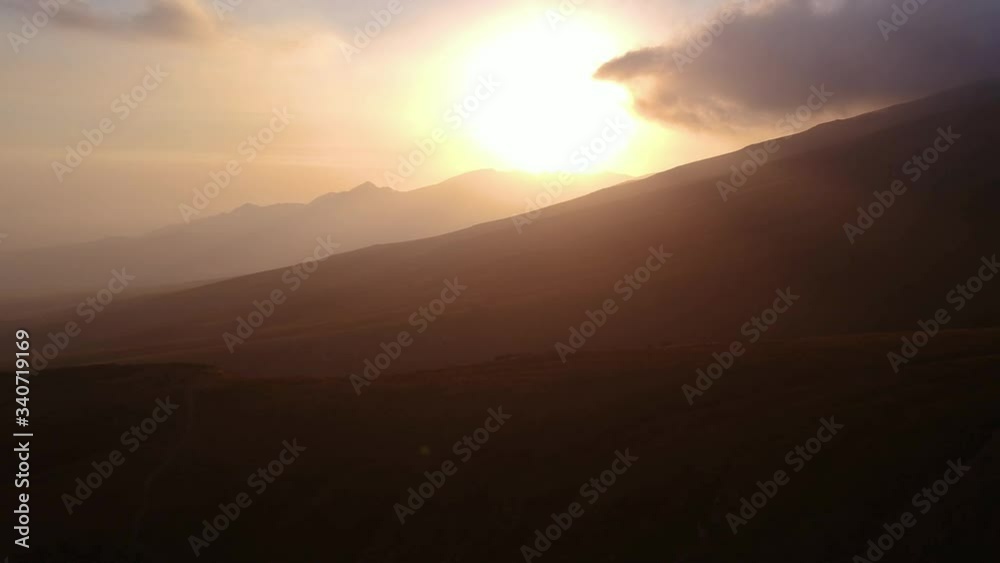 Dreamy and hazy Peruvian landscape at sunset. Aerial pan. Dreamy and hazy Peruvian landscape at sunset. Aerial pan.