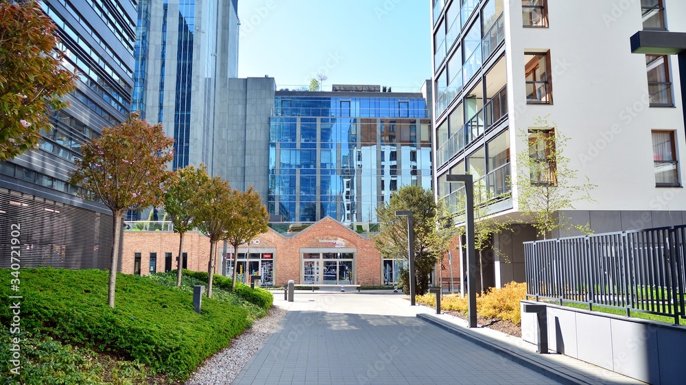 Modern apartment building on a sunny day with a blue sky. Facade of a modern apartment.