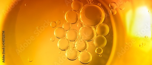 Cooking oil, cooking background, yellow oil drops and water kitchen.