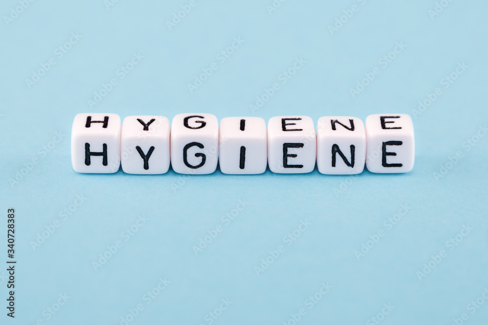 word composed with cubes on a blue background word composed with cubes on a blue background