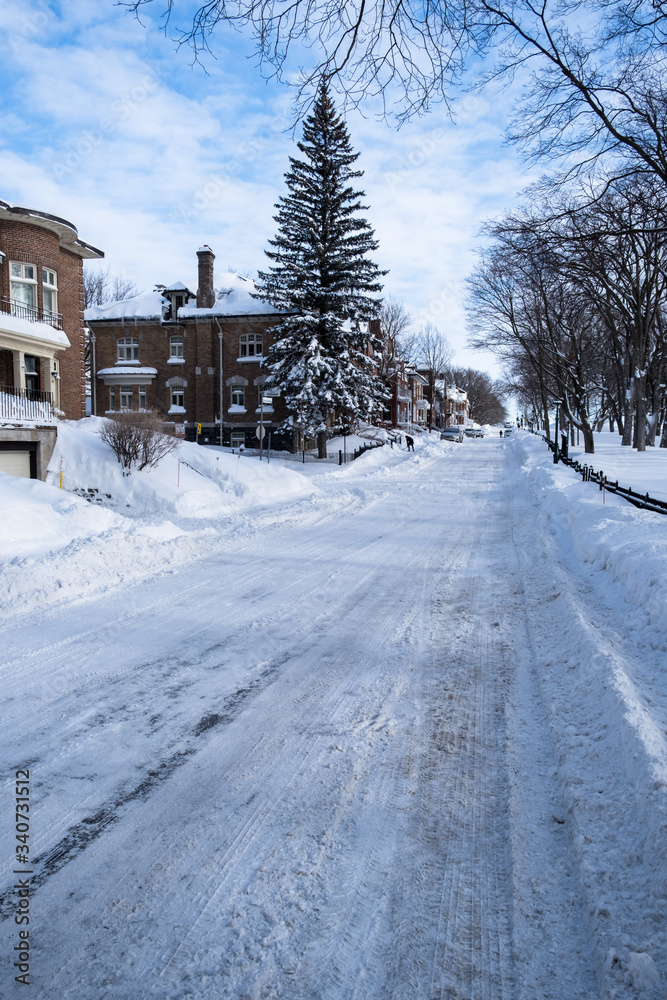 Houses and street covered with lot of snow in Canada Houses and street covered with lot of snow in Canada
