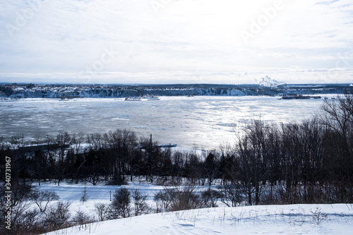 Frozen Saint Laurent river in Quebec city at winter time. © Nicolas
